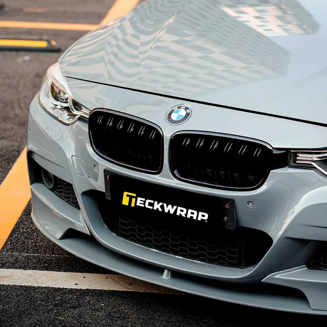 High Gloss True Nardo Grey Vinyl Wrap on bmw front bumper