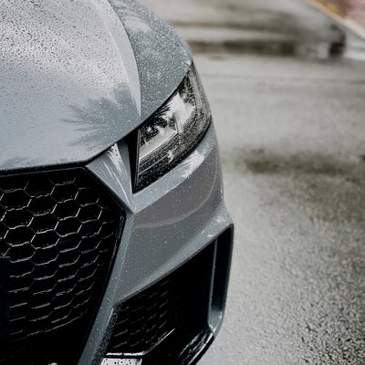 Audi TT RS headlight close-up High Gloss True Nardo Grey Vinyl Wrap