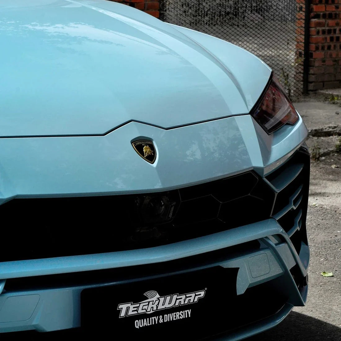 High Gloss Yacht Blue Vinyl Wrap on clos up Lamborghini