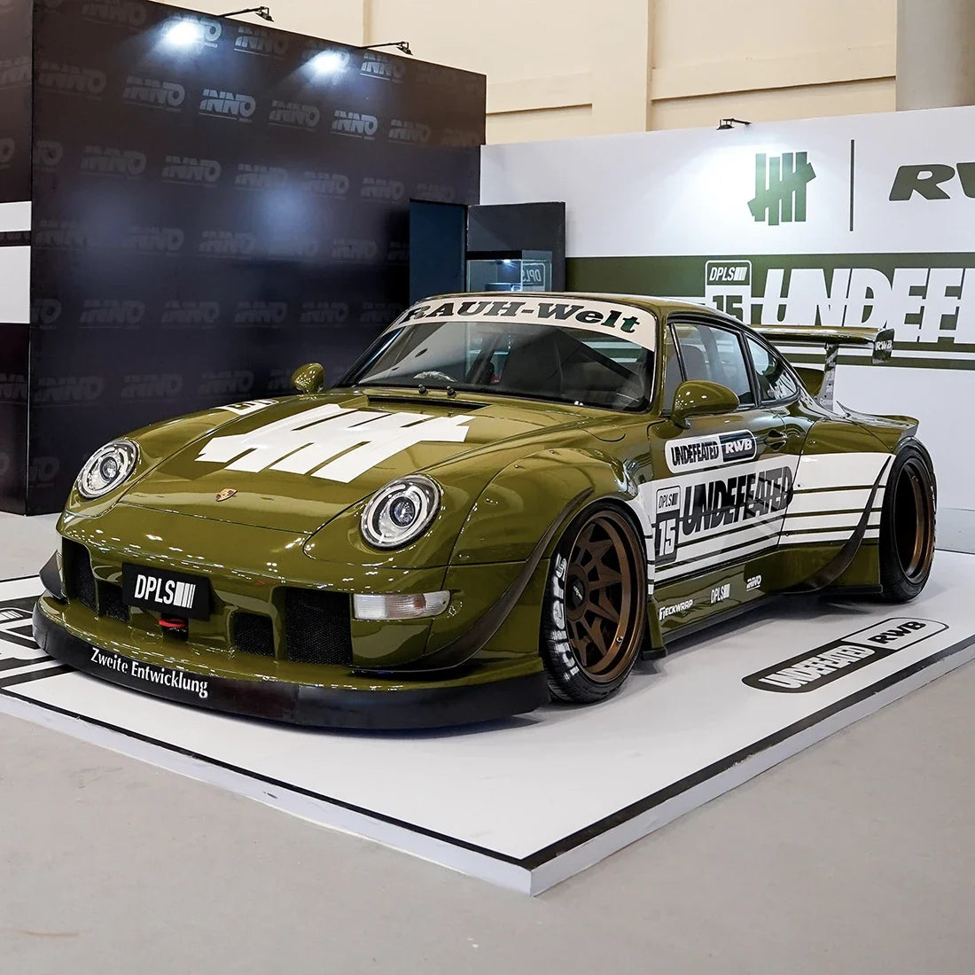High Gloss Khaki Green Vinyl Wrap on Porsche Three-Fourth View