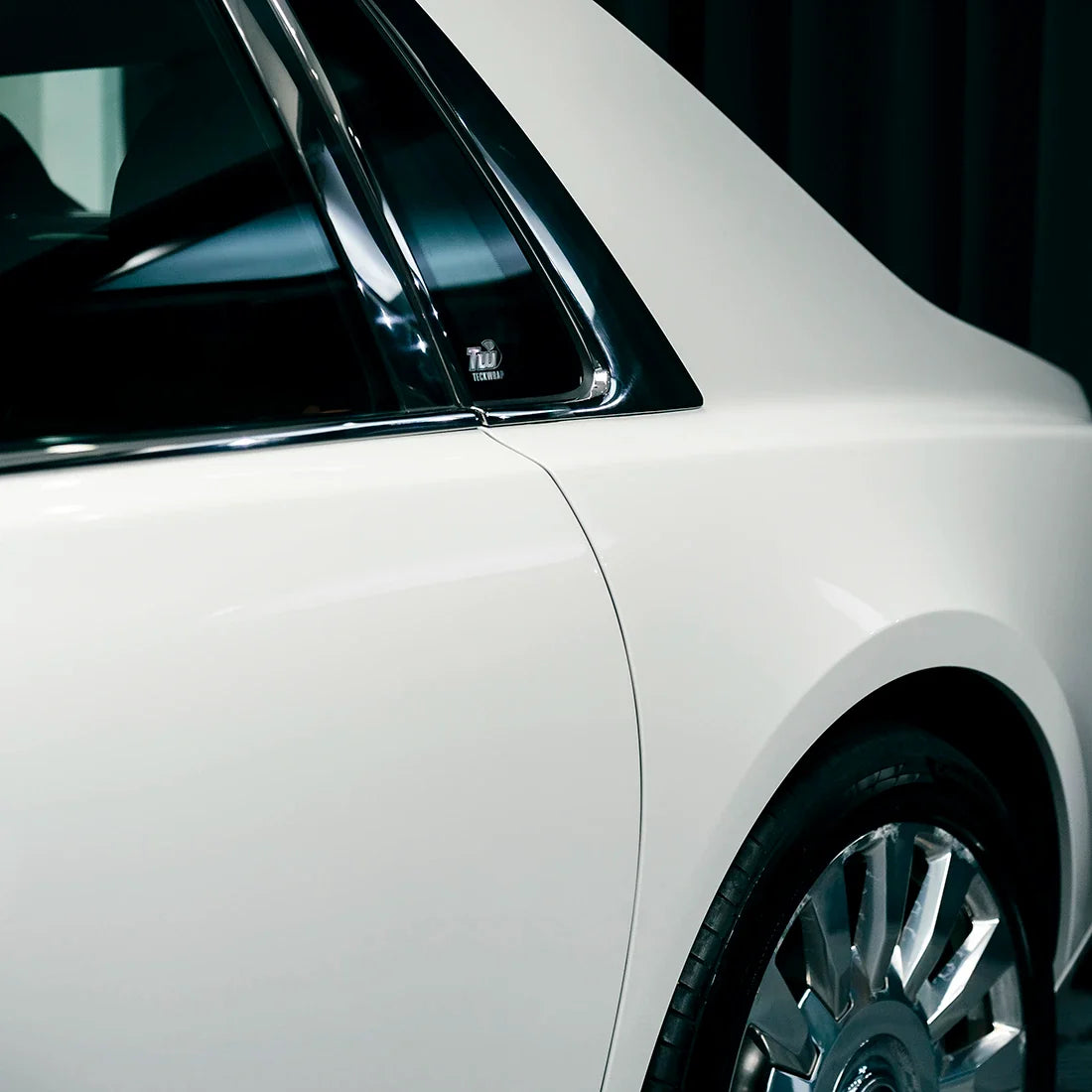 High Gloss Pale Celadon Vinyl Wrap on Rolls Royce Quarter Panel View