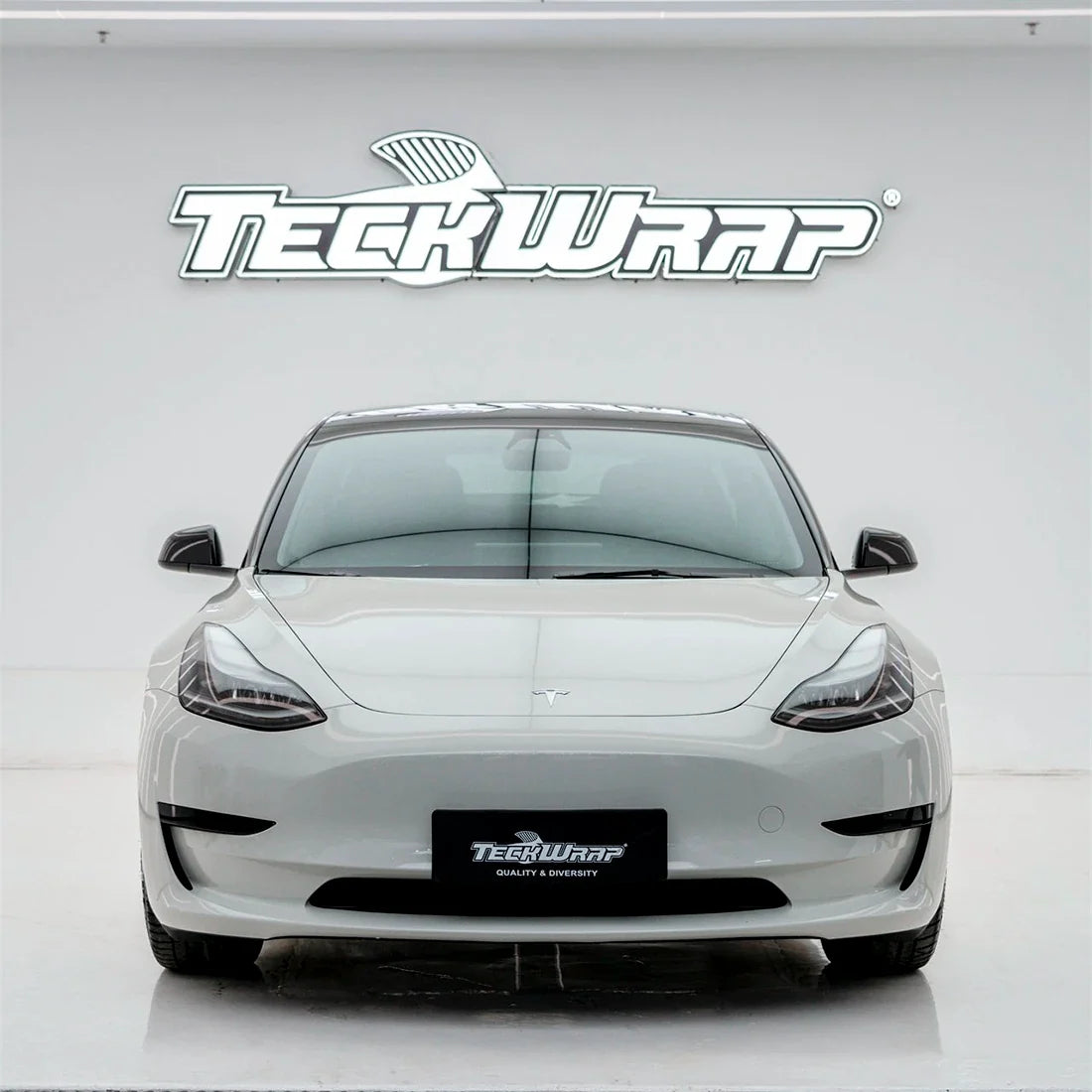 High Gloss Pale Celadon Vinyl Wrap on Tesla Front View