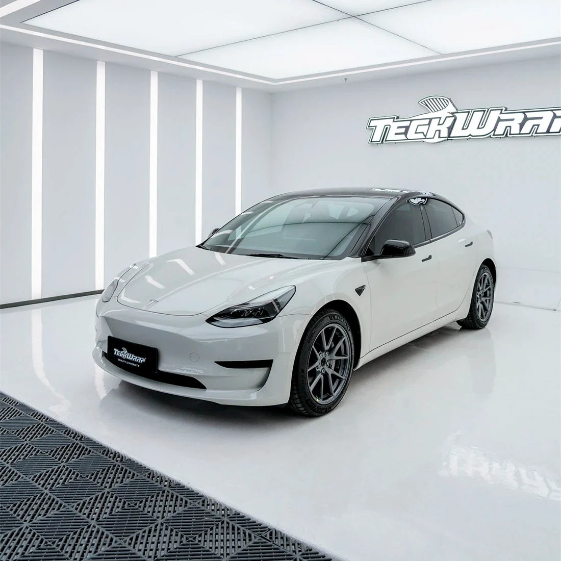 High Gloss Pale Celadon Vinyl Wrap on Tesla side