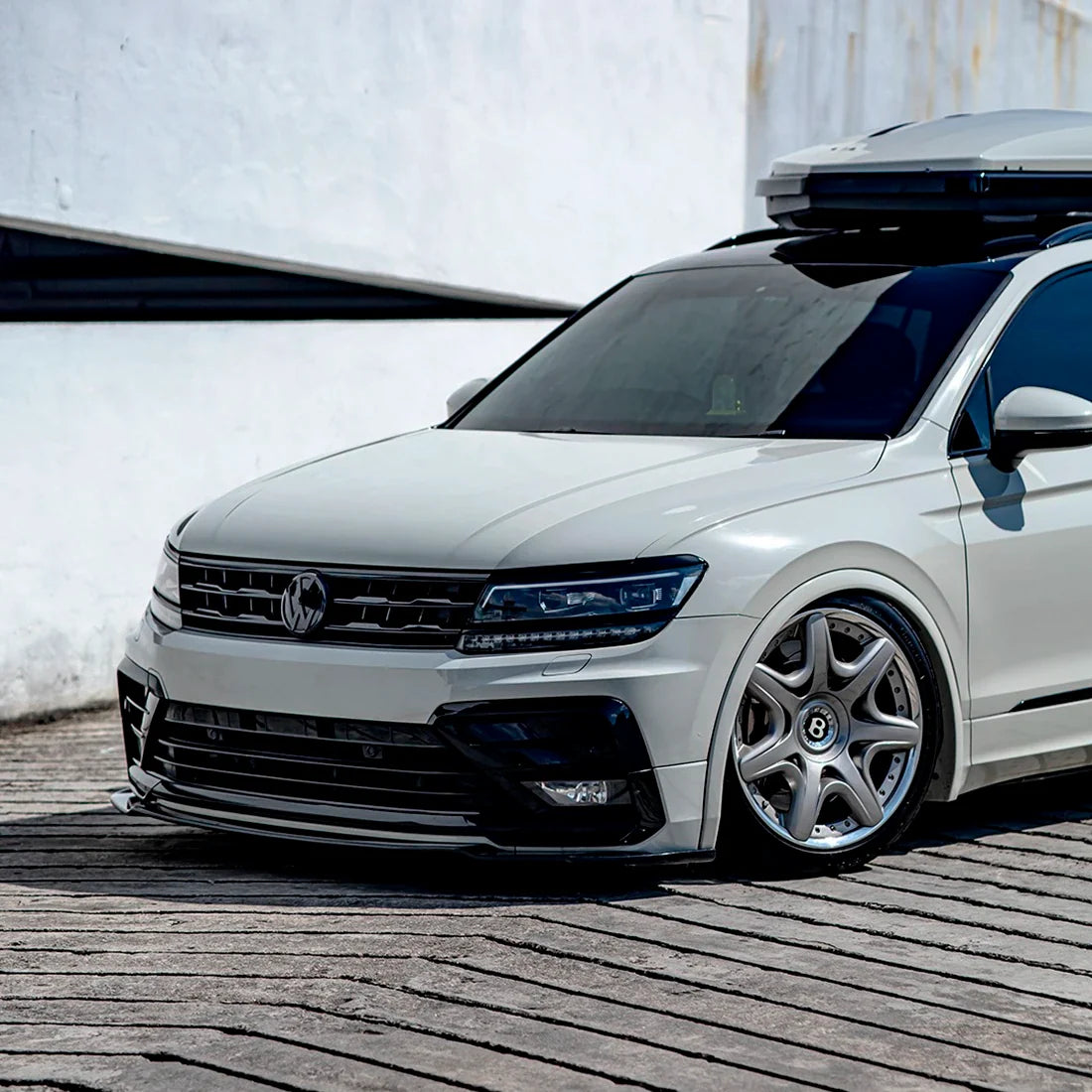 High Gloss Pale Celadon Vinyl Wrap on Volkswagen Front Close-Up