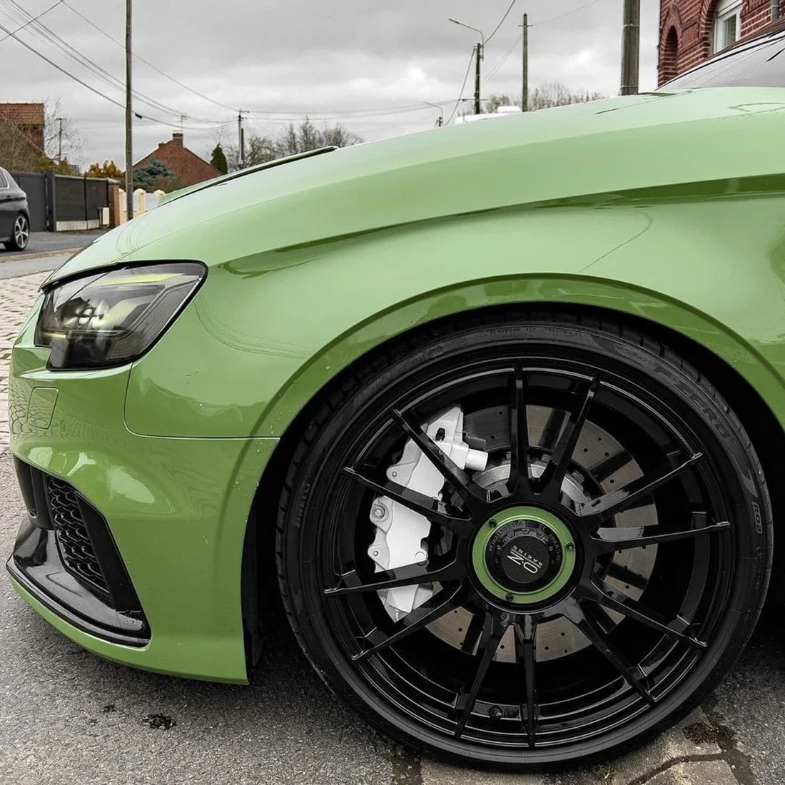High Gloss French Olive Green Vinyl Wrap on Audi Hood View