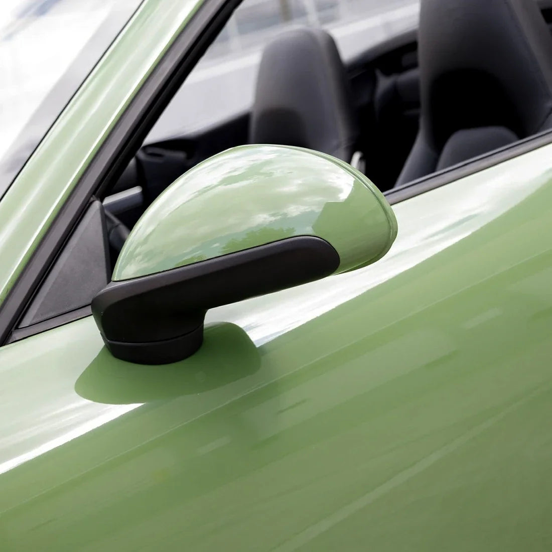 High Gloss French Olive Green Vinyl Wrap on Porsche Mirror Close-Up