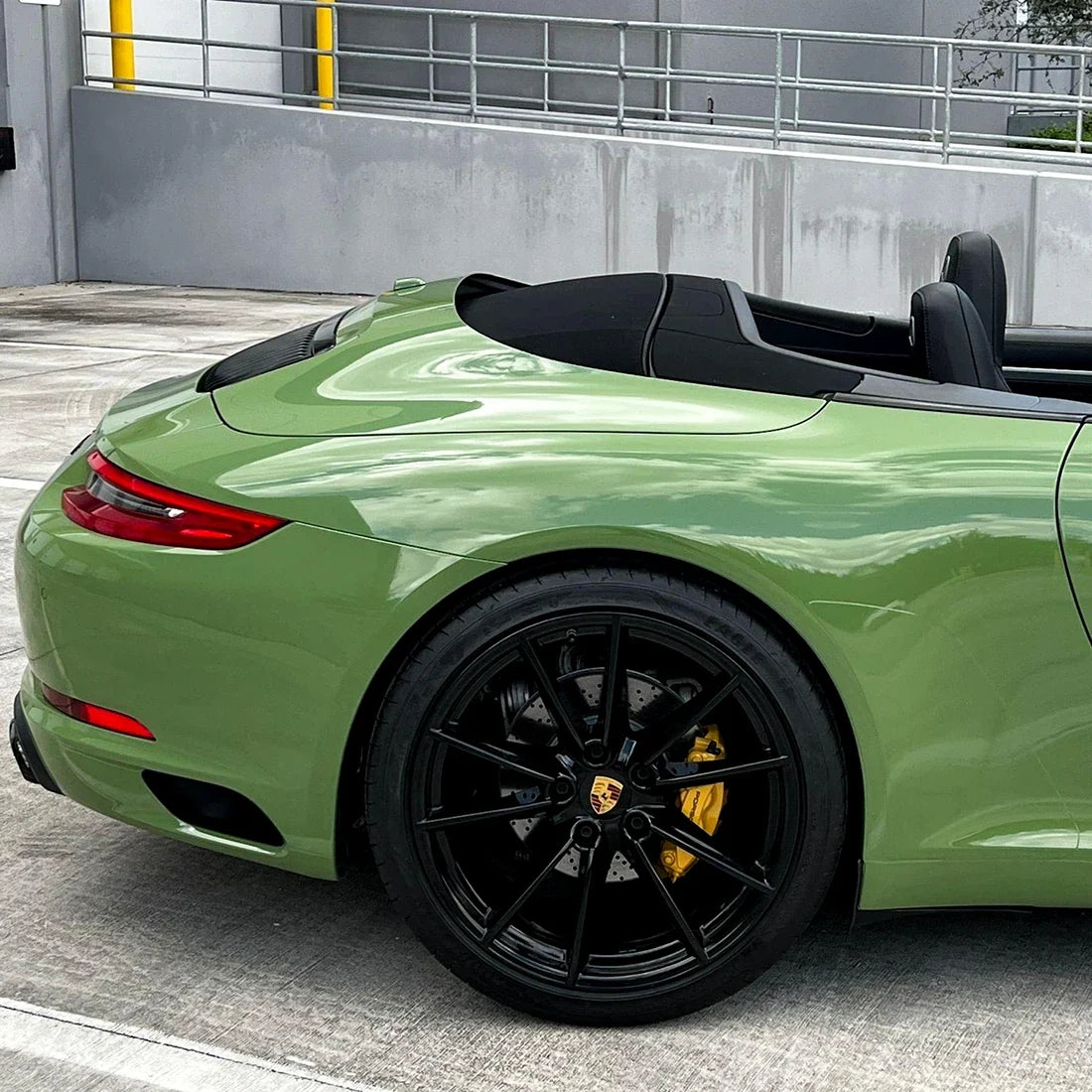 High Gloss French Olive Green Vinyl Wrap on Porsche Quarter Panel View