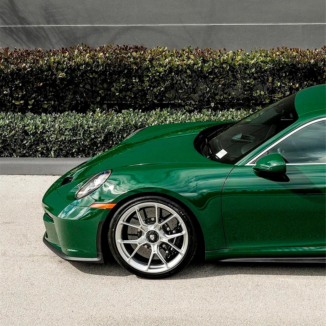High Gloss Amphibian Green Vinyl Wrap on Porsche Fender View