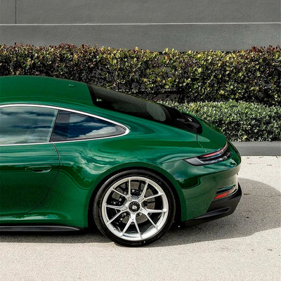 High Gloss Amphibian Green Vinyl Wrap on Porsche Quarter Panel View