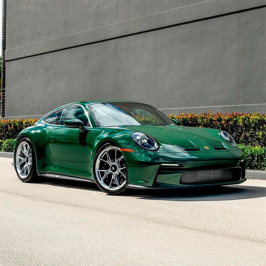 High Gloss Amphibian Green Vinyl Wrap on Porsche Front View