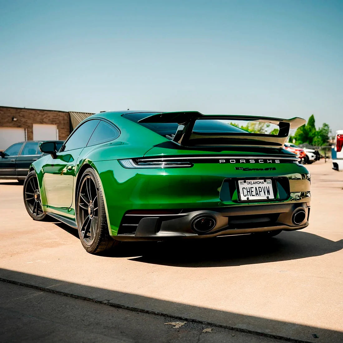 High Gloss Amphibian Green Vinyl Wrap on Porsche Back View