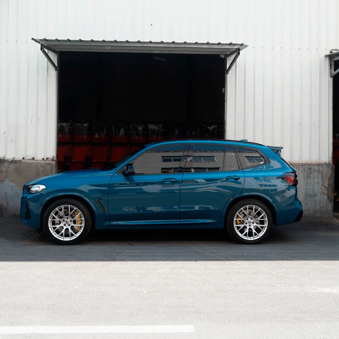 High Gloss Avalon Teal Vinyl Wrap on BMW Side View