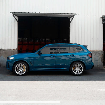 High Gloss Avalon Teal Vinyl Wrap on BMW Side View