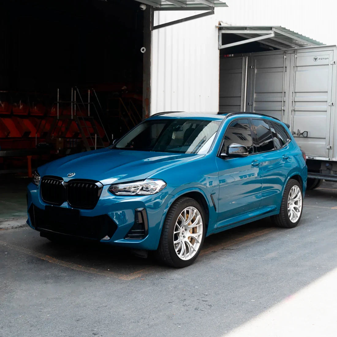 High Gloss Avalon Teal Vinyl Wrap on BMW Three-Fourth View