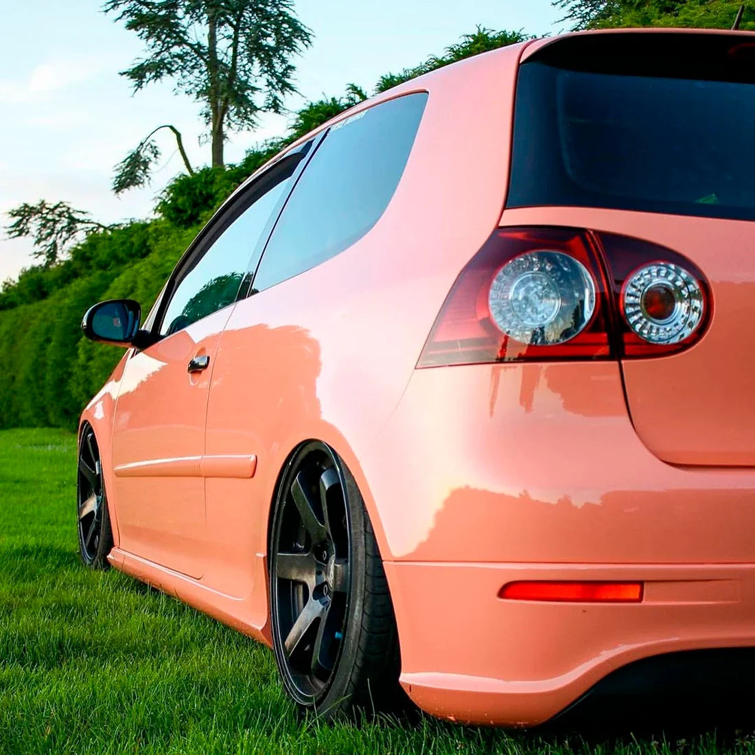 High Gloss Amber Rose Vinyl Wrap on Golf Rear Close-Up