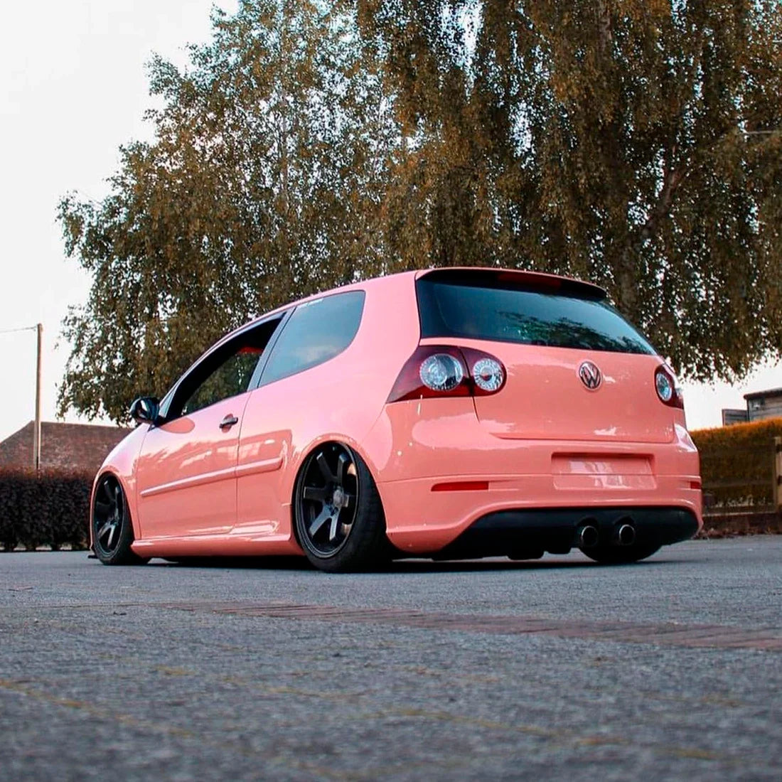 High Gloss Amber Rose Vinyl Wrap on Golf Rear tailight View