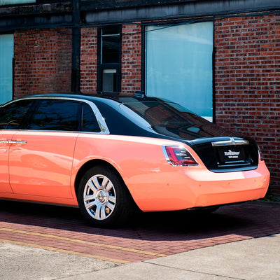 High Gloss Amber Rose Vinyl Wrap on Rolls Royce Rear Close-Up