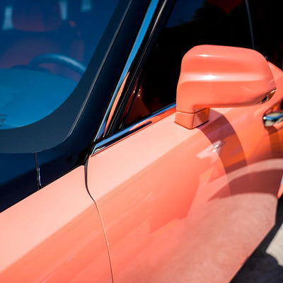 High Gloss Amber Rose Vinyl Wrap on Rolls Royce Mirror Close-Up