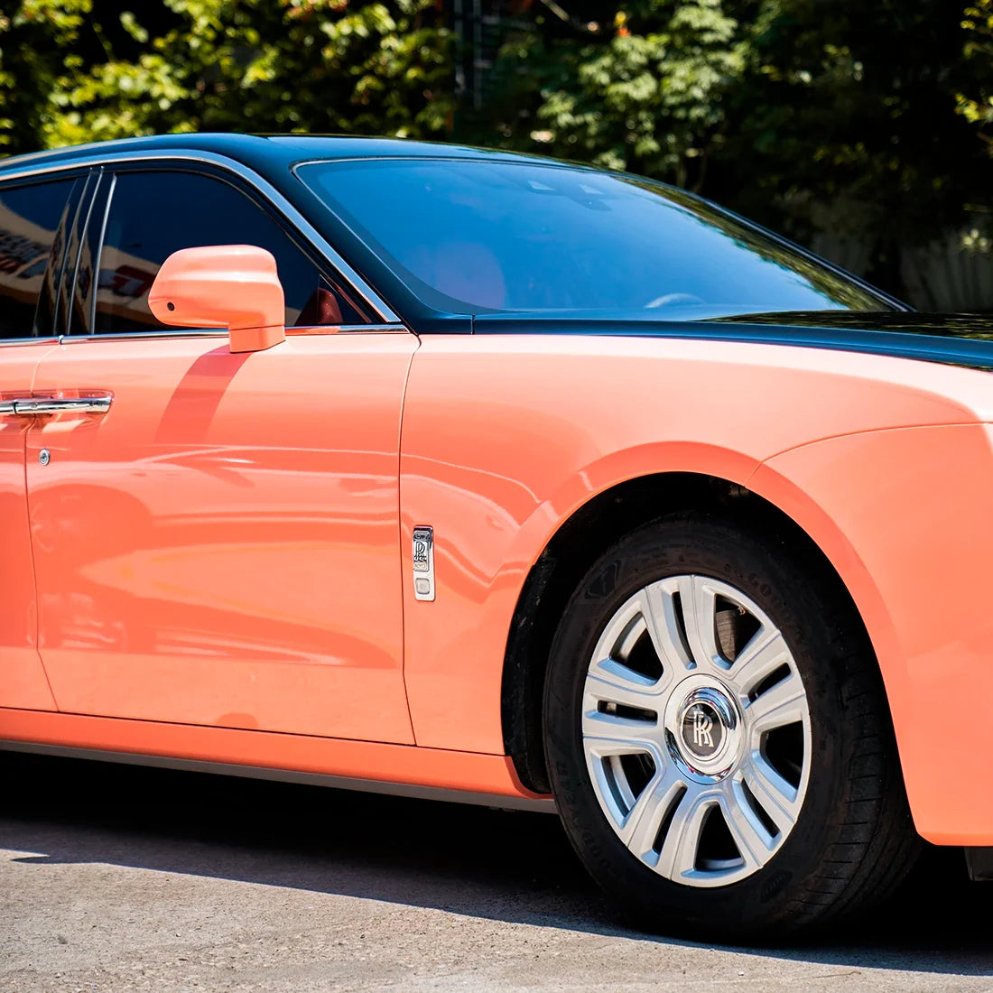 High Gloss Amber Rose Vinyl Wrap on Rolls Royce Side Close-Up