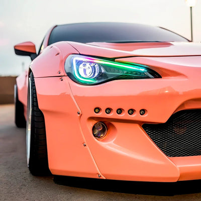 High Gloss Amber Rose Vinyl Wrap on Supra Headlight Close-Up