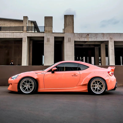High Gloss Amber Rose Vinyl Wrap on Supra Side View