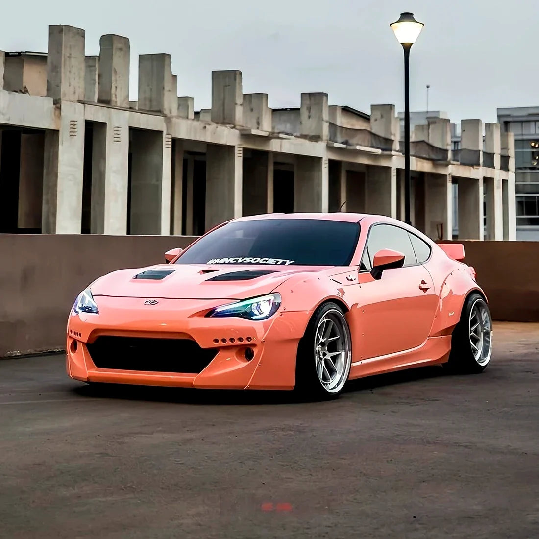 High Gloss Amber Rose Vinyl Wrap on Supra Front View