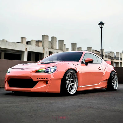High Gloss Amber Rose Vinyl Wrap on Supra Rear Headlight View