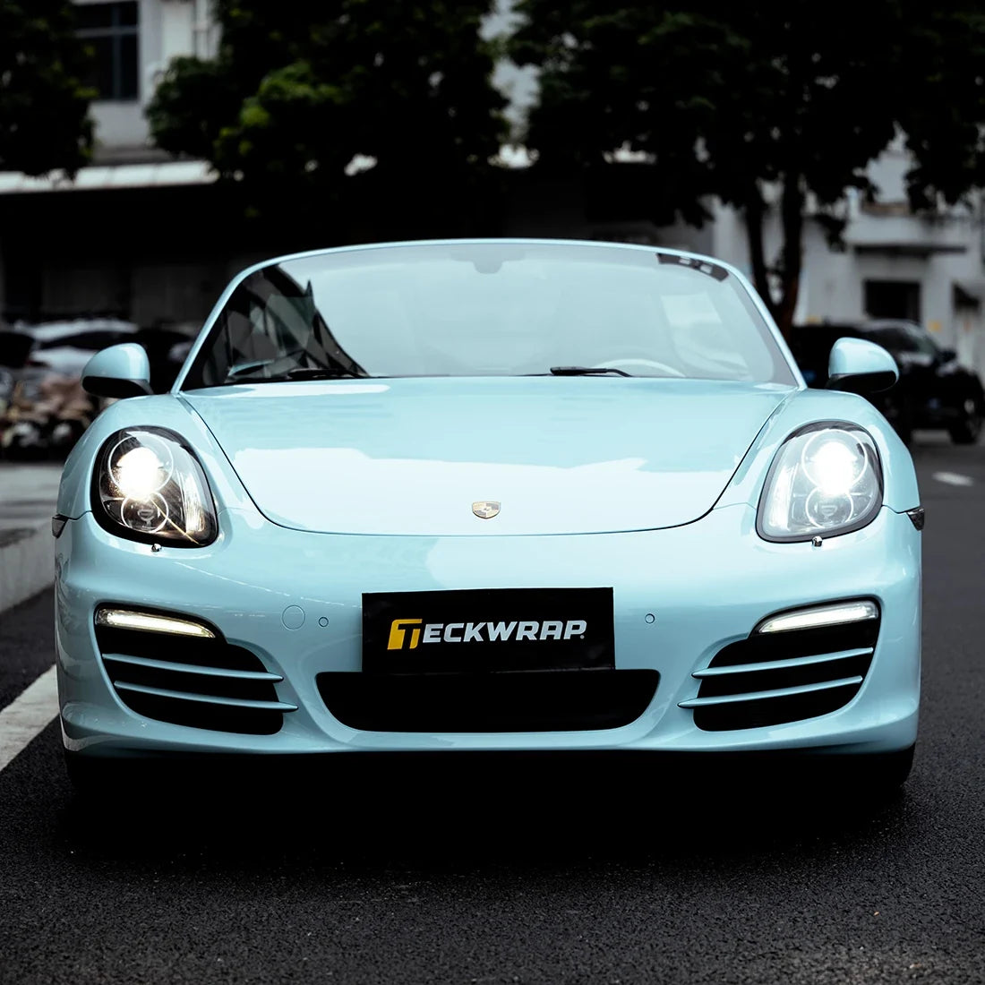 High Gloss Bali Blue Vinyl Wrap on Porsche Front Full View