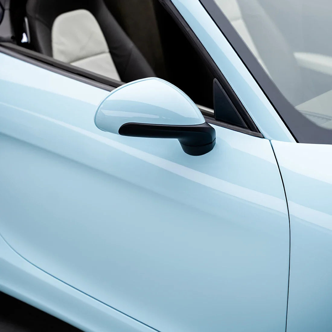 High Gloss Bali Blue Vinyl Wrap on Porsche Mirror Close-Up