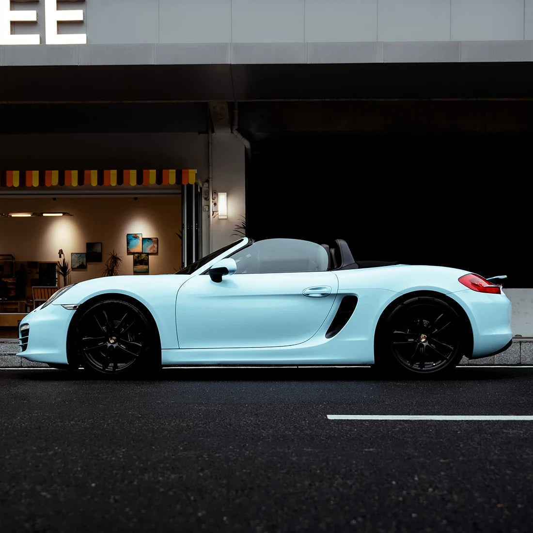 High Gloss Bali Blue Vinyl Wrap on Porsche Side Full View