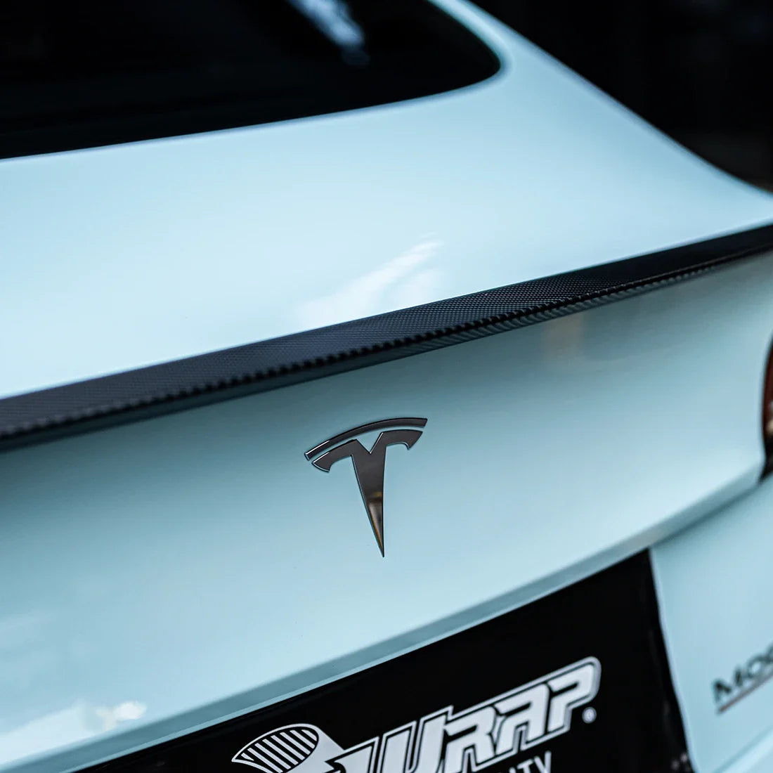 High Gloss Bali Blue Vinyl Wrap on Tesla Trunk View