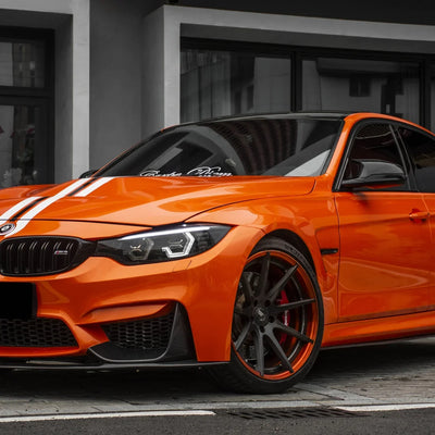 High Gloss Tangerine Orange Vinyl Wrap on BMW M3 Front Angle View