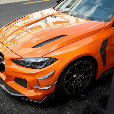 High Gloss Tangerine Orange Vinyl Wrap on BMW M4 Front Close-Up