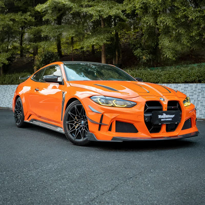High Gloss Tangerine Orange Vinyl Wrap on BMW M4 Side Angle View