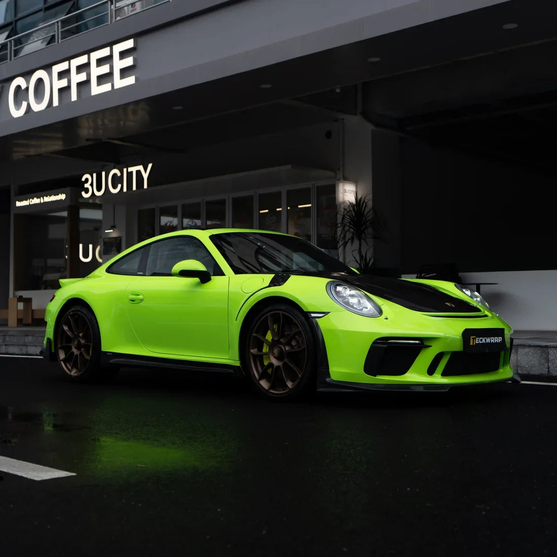 High Gloss Gecko Green Vinyl Wrap on Porsche 911 Side View