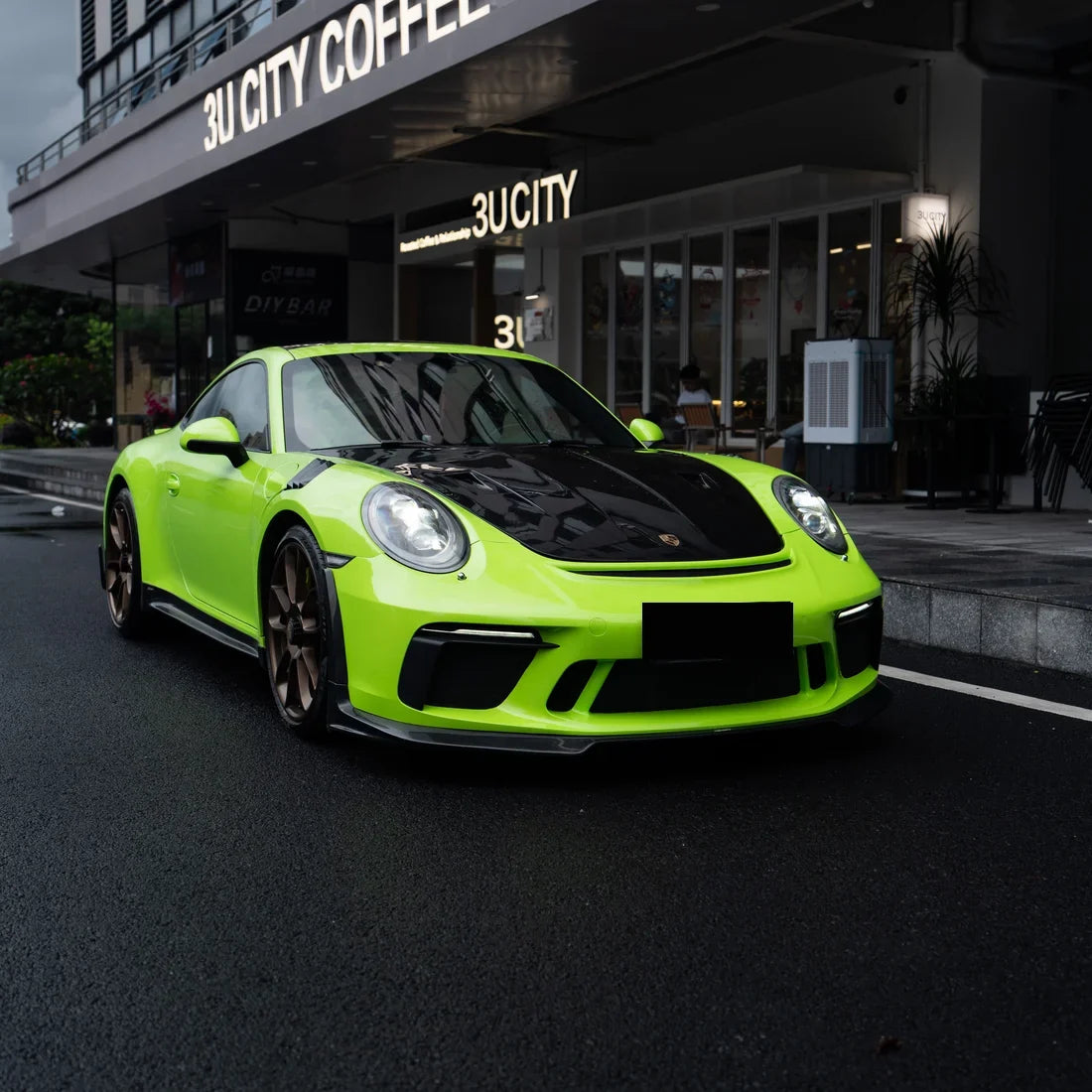 High Gloss Gecko Green Vinyl Wrap on Porsche 911 Rear Angle View