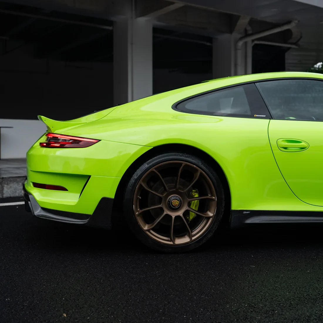 High Gloss Gecko Green Vinyl Wrap on Porsche 911 Side View