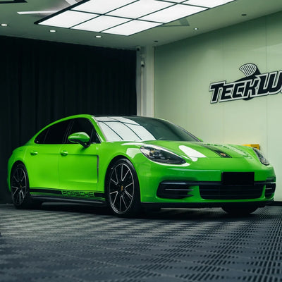 High Gloss Gecko Green Vinyl Wrap on Porsche Side View