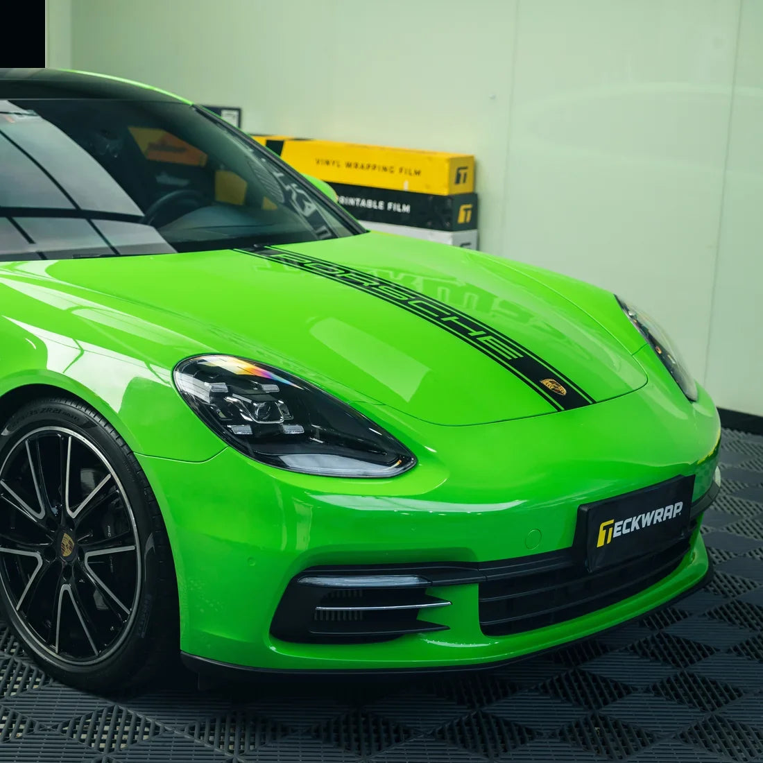 High Gloss Gecko Green Vinyl Wrap on Porsche Side View