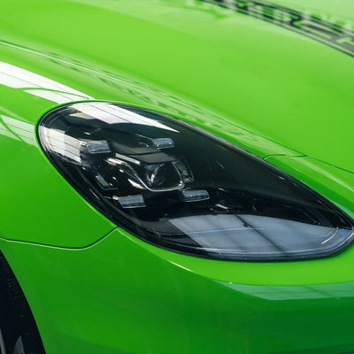High Gloss Gecko Green Vinyl Wrap on Porsche Front Close-Up