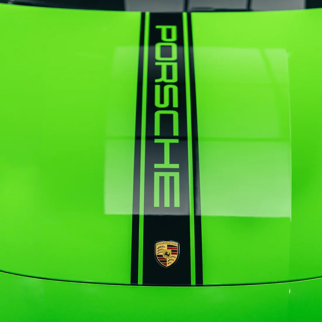 High Gloss Gecko Green Vinyl Wrap on Porsche Door Close-Up