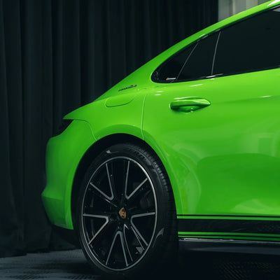 High Gloss Gecko Green Vinyl Wrap on Porsche Front Close-Up