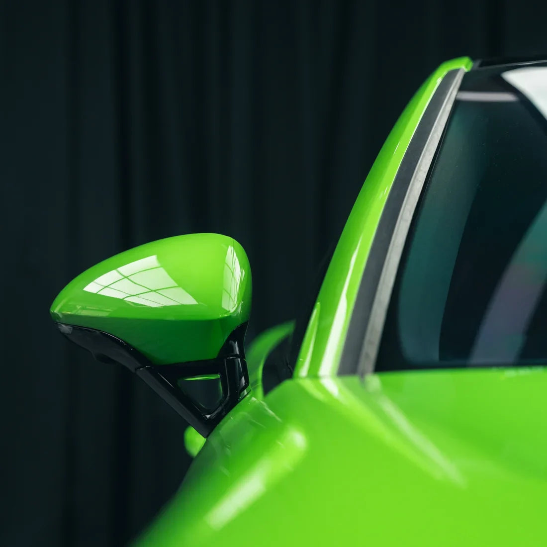 High Gloss Gecko Green Vinyl Wrap on Porsche Mirror Close-Up