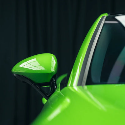 High Gloss Gecko Green Vinyl Wrap on Porsche Mirror Close-Up