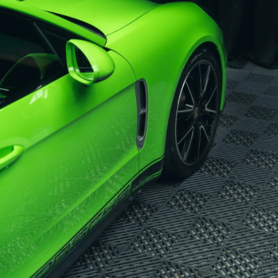 High Gloss Gecko Green Vinyl Wrap on Porsche Side Angle View