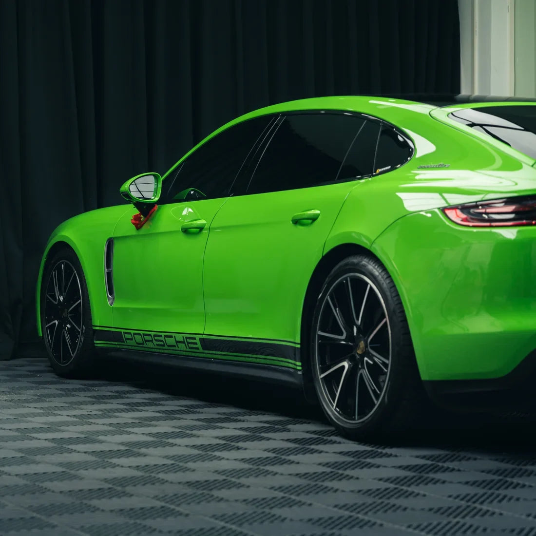High Gloss Gecko Green Vinyl Wrap on Porsche Side View