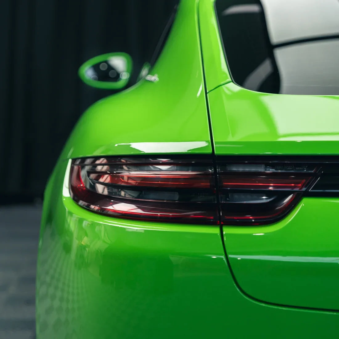 High Gloss Gecko Green Vinyl Wrap on Porsche Rear Close-Up