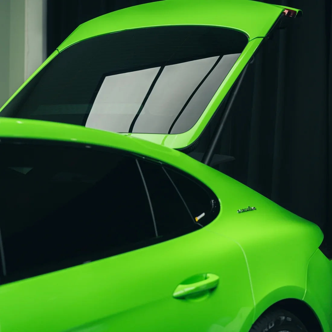 Gloss Gecko Green Vinyl Wrap on Porsche Hood Close-Up