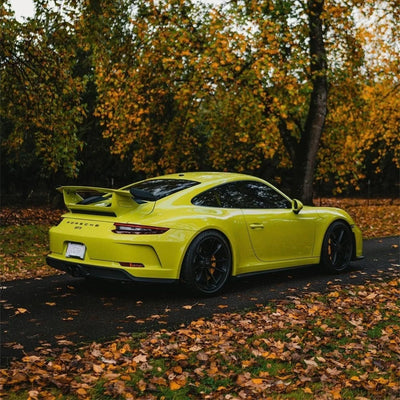 High Gloss Grape Green Vinyl Wrap on Porsche Side Angle View
