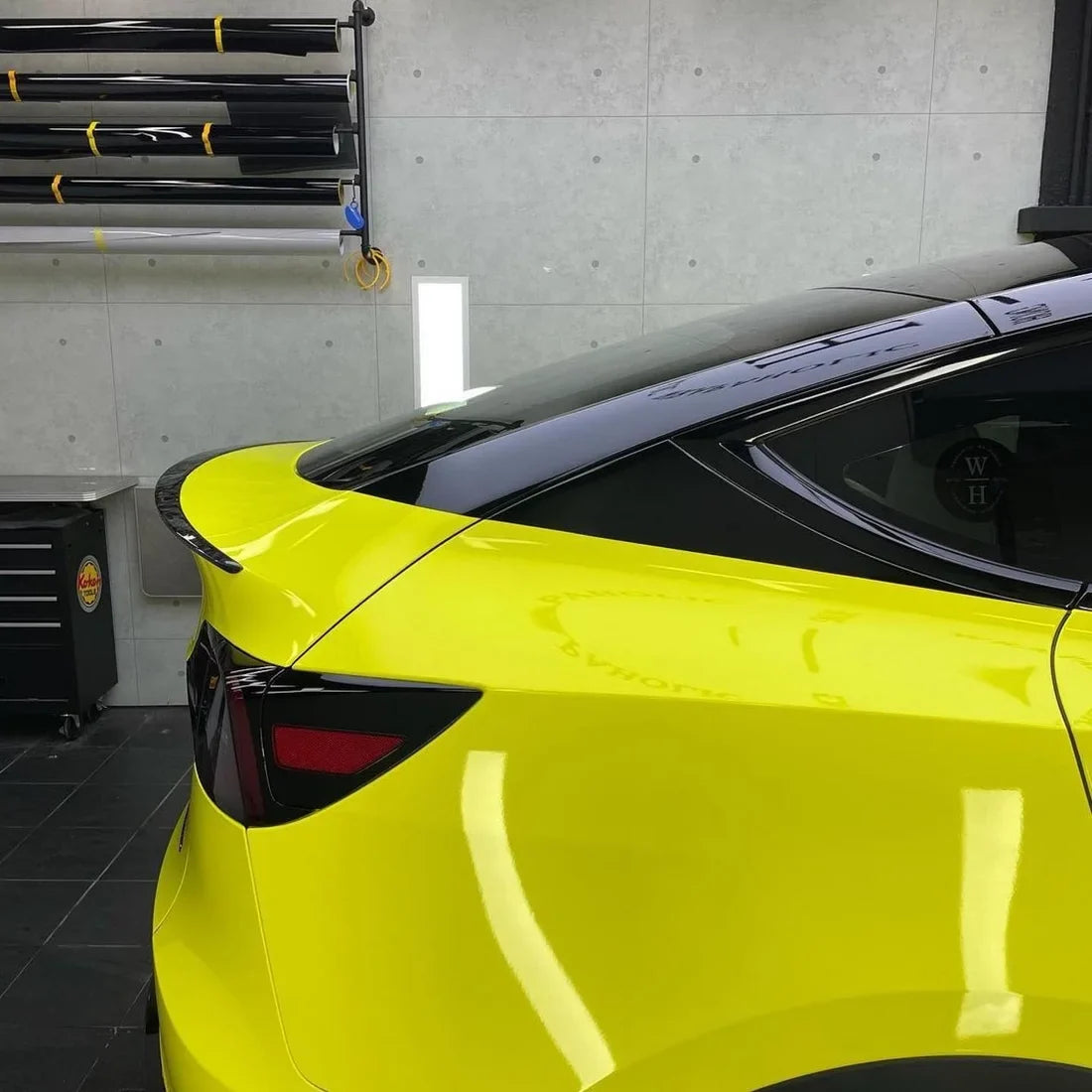 High Gloss Grape Green Vinyl Wrap on Tesla Hood Angle View